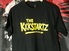 The Kickstartz - Black tee with yellow print